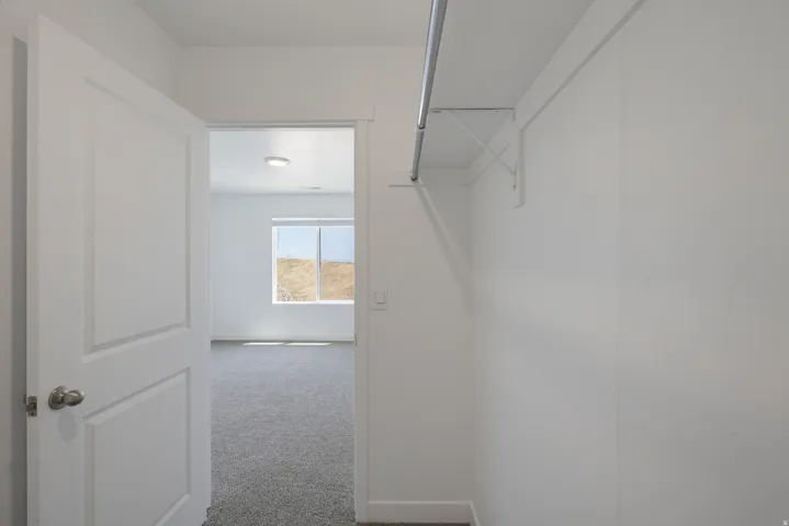 Wardrobe with a hanging rod and upper shelf