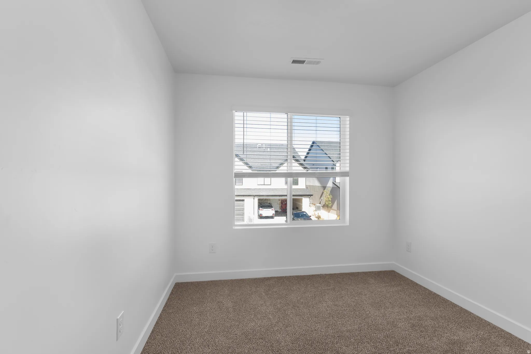 Neutral wall colors with textured carpeting