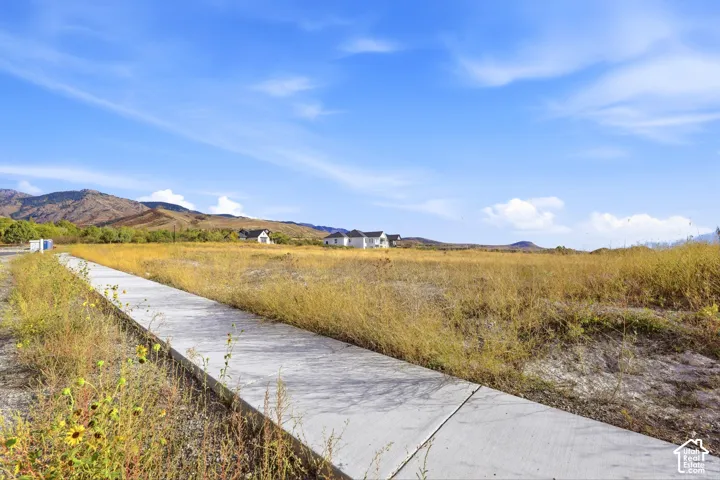 Expansive lot with distant mountain backdrop