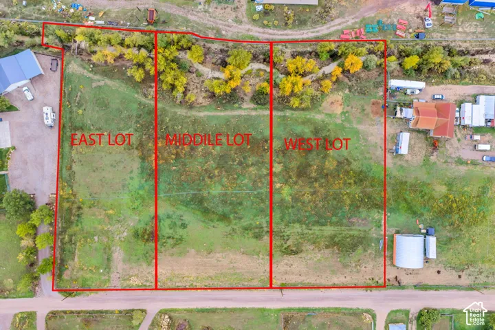 Expansive land parcel divided into three distinct lots