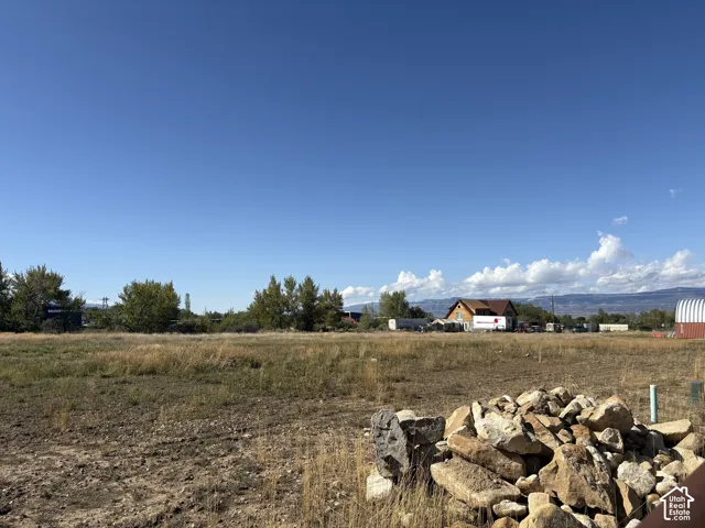 Expansive undeveloped land with distant mountain scenery View to the North West