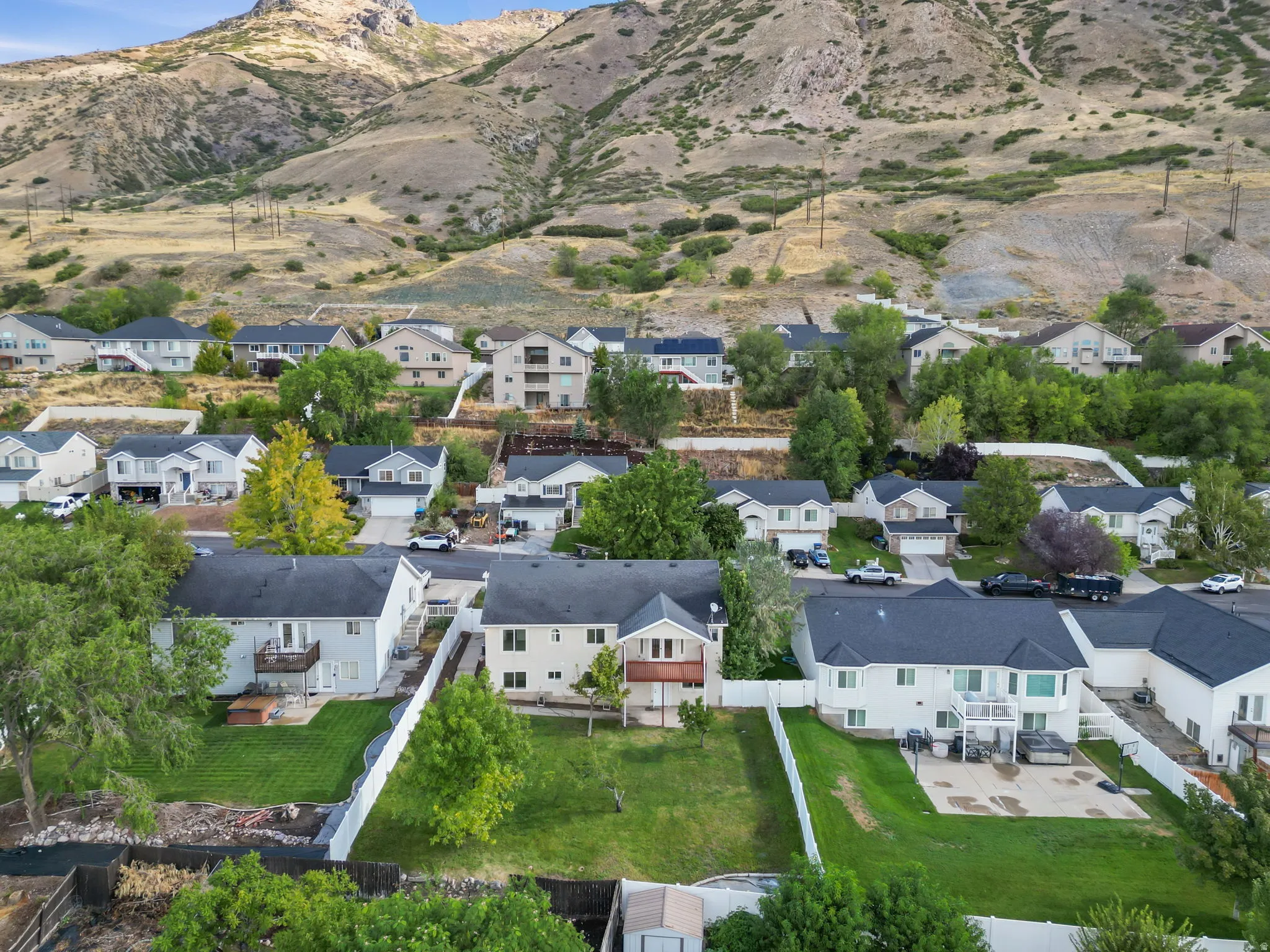 Neighborhood setting with a mountain backdrop