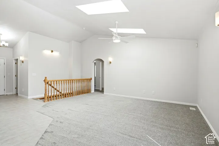 Vaulted ceilings with dual skylights and ceiling fan