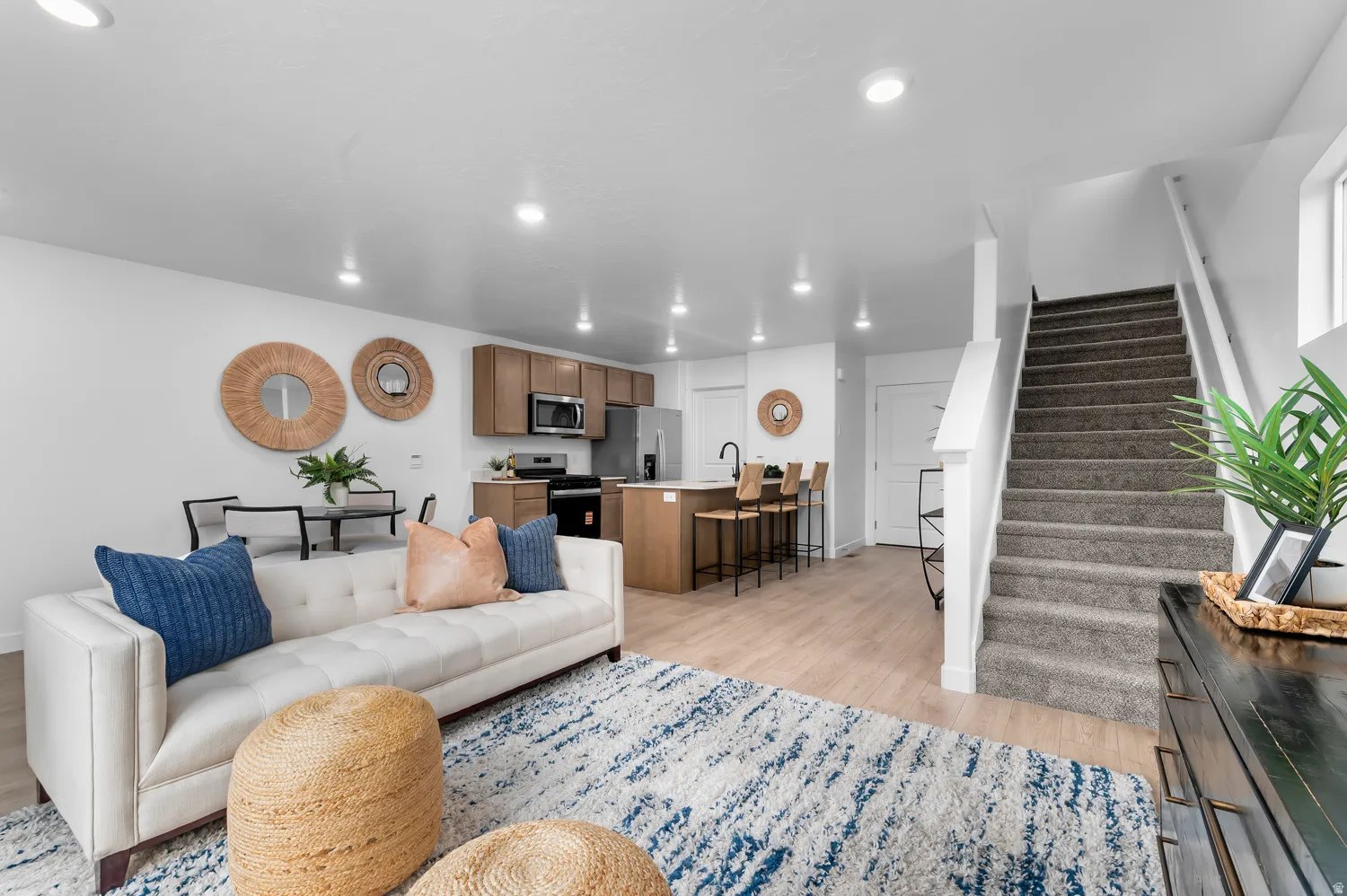 Open-concept living area featuring recessed lighting