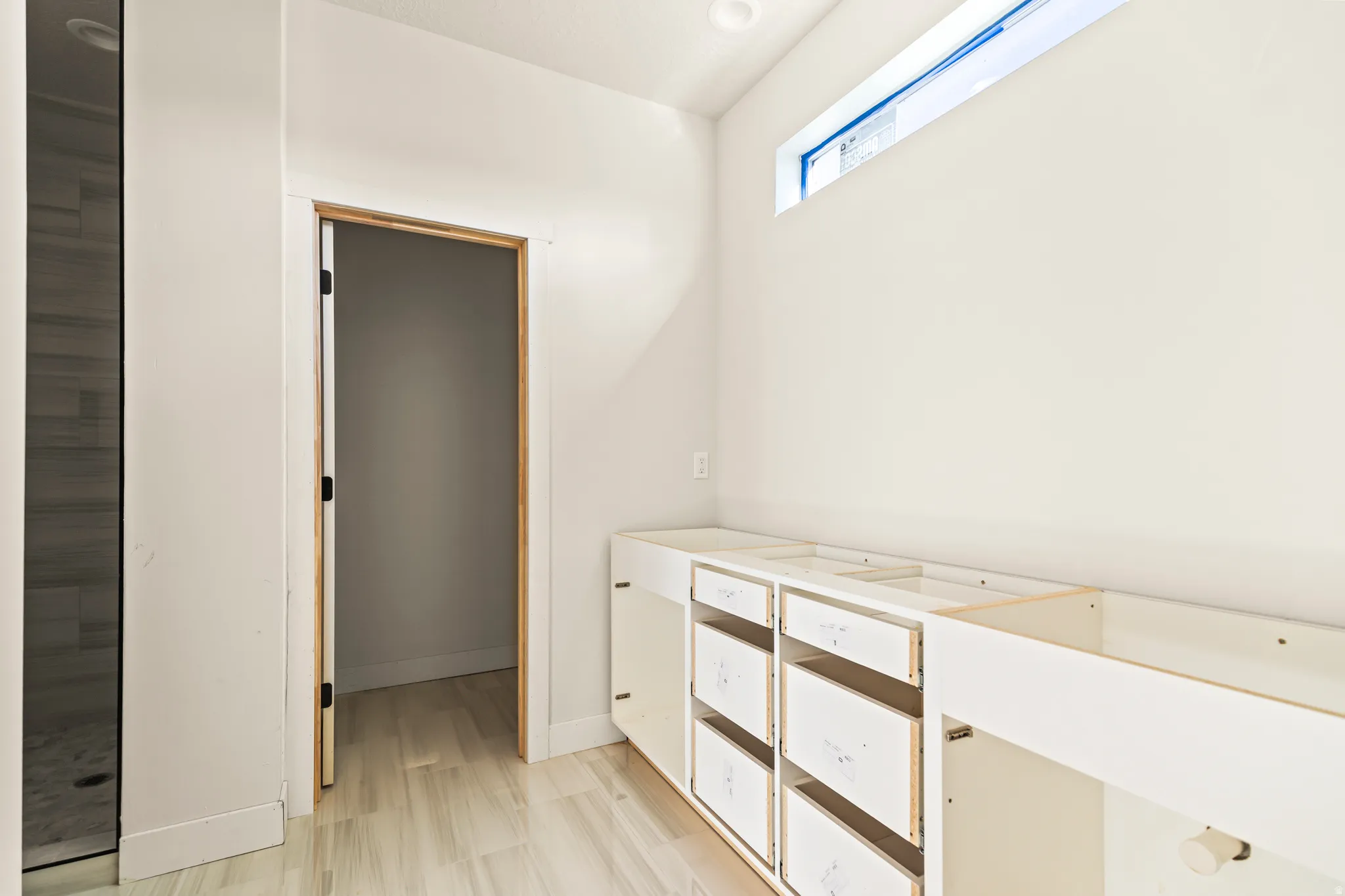Wood-finish flooring with an elongated window