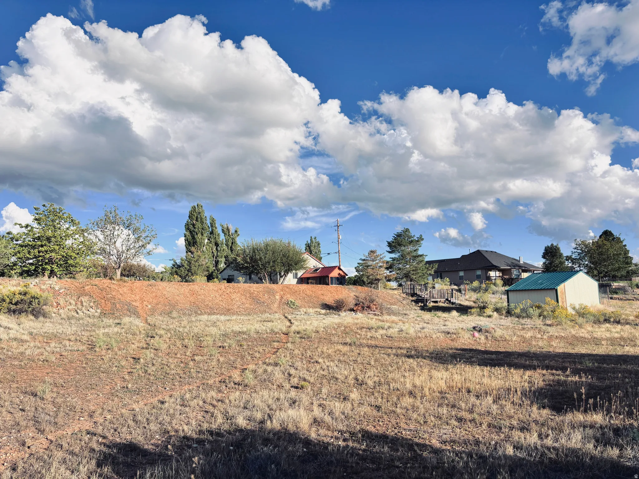 Expansive sloped terrain with natural vegetation