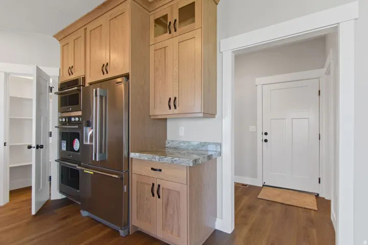 Wood-finish flooring throughout