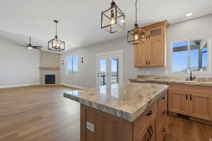 Kitchen island with a light-toned stone countertop