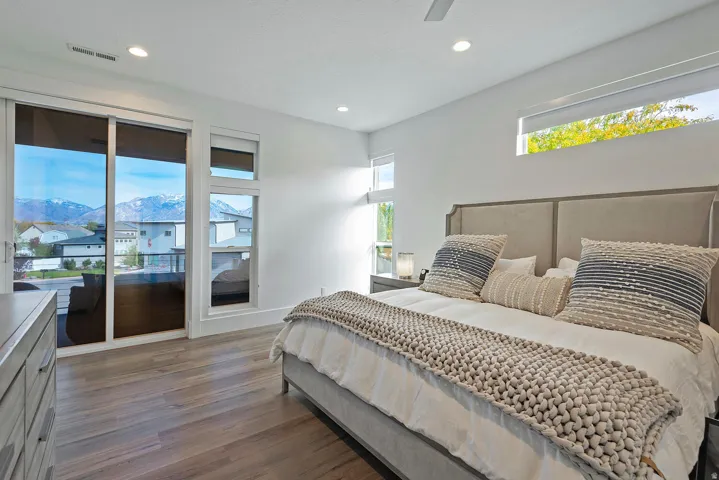 Wood-finish flooring with a large sliding glass door