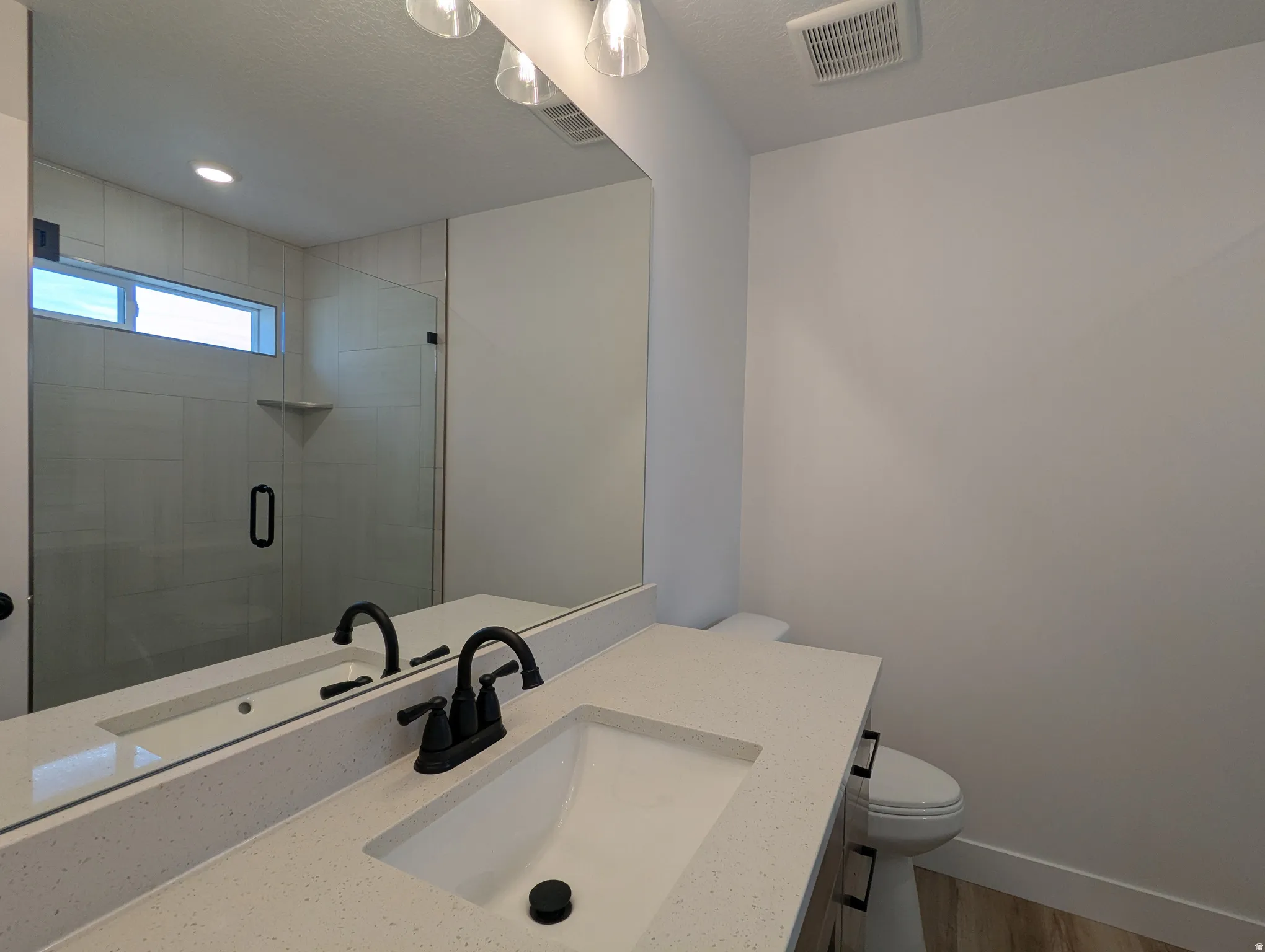 Photo from a previously built Madeline.Primary Bathroom with Large Shower.