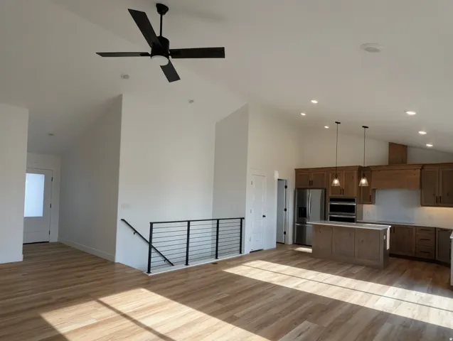 Photo from a previously built Madeline.Entry Way, Living Room, Kitchen.