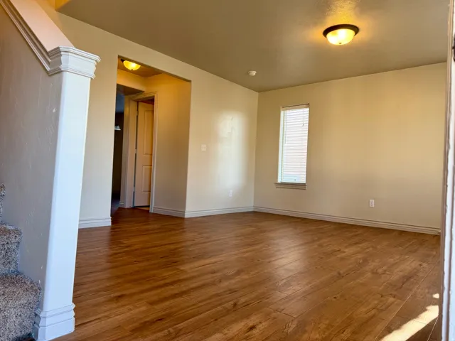 Family room with wood-finish flooring