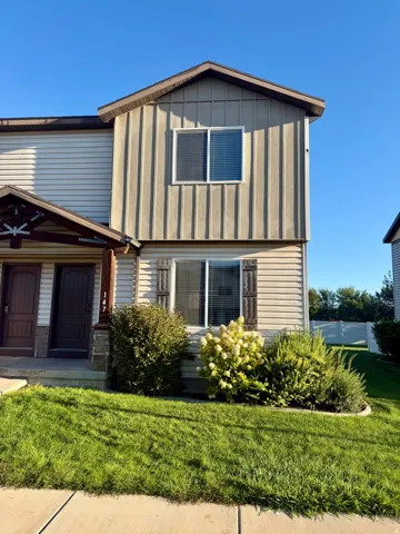 Two-story siding exterior with board and batten accents
