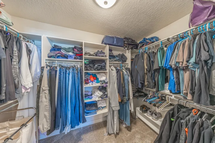 Primary suite's walk-in closet