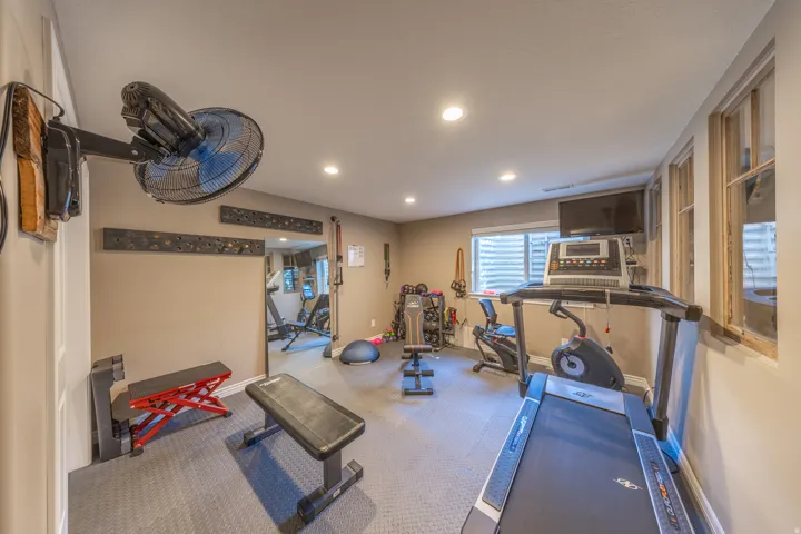 3rd finished bedroom in the basement currently being used as a workout room