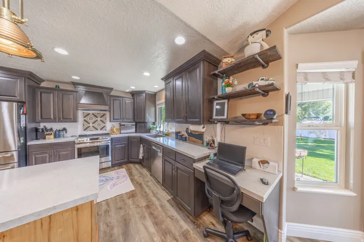 Another view of the kitchen showing the  built-in desk area