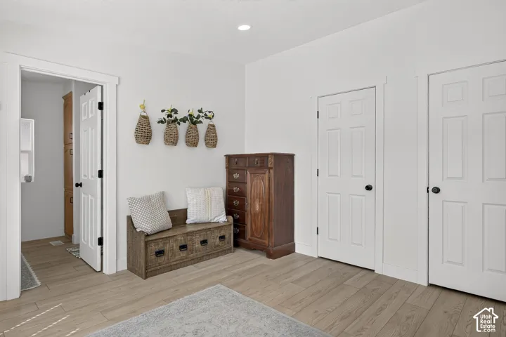 Wood-finish flooring with white walls