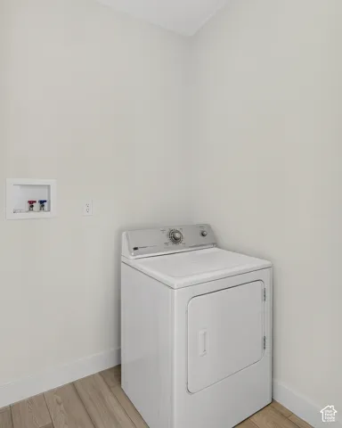 Wood-finish flooring with crisp white walls