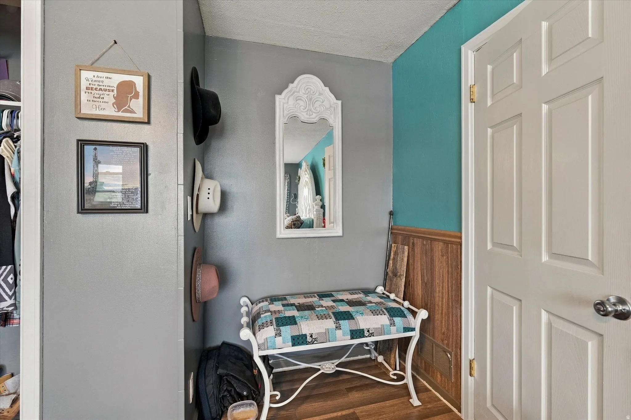 Wood-finish flooring, two-panel interior door, and beadboard paneling