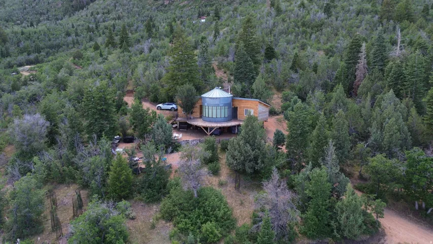 Wood-sided structure with a metal silo feature