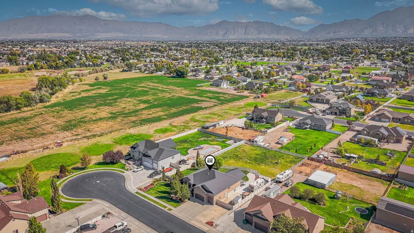 Aerial perspective featuring a cul-de-sac and mountain range backdrop