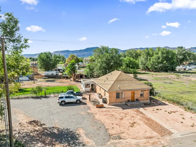 Brick exterior with a gabled roof and front entry steps