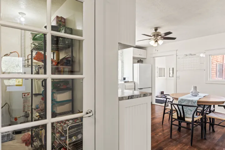 Wood-finish flooring and a ceiling fan with integrated lighting