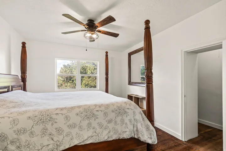 White walls with wood-finish flooring