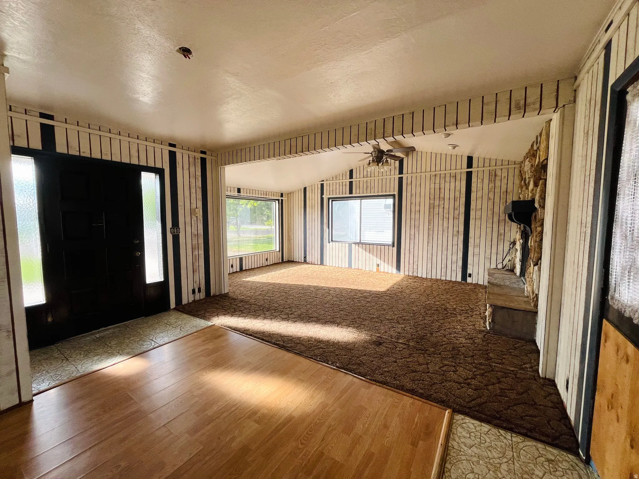 Welcoming entryway leading into the home’s spacious living areas.