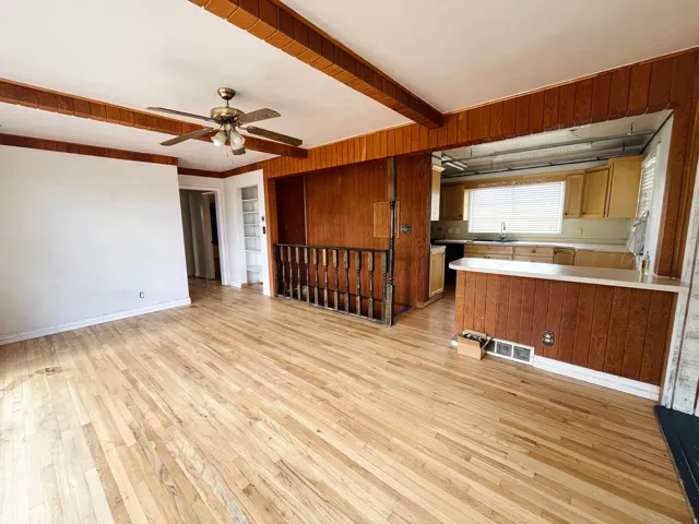 Beautiful formal dining room featuring hardwood floors.