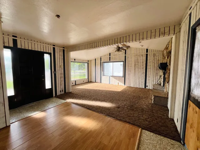 Welcoming entryway leading into the home’s spacious living areas.