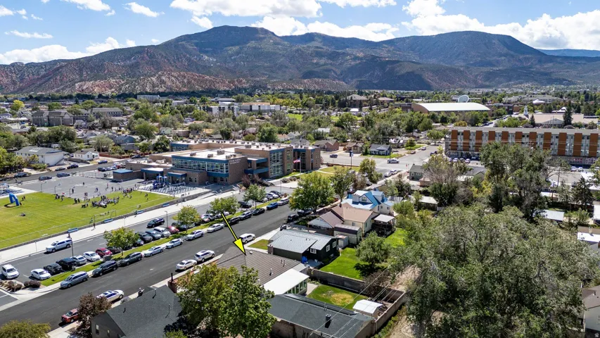 Mountain backdrop with a residential area and institutional buildings