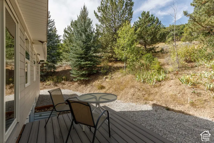 Wood-finish decking with a gravel ground cover