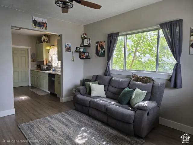 Wood-finish flooring throughout, paired with light gray wall tones