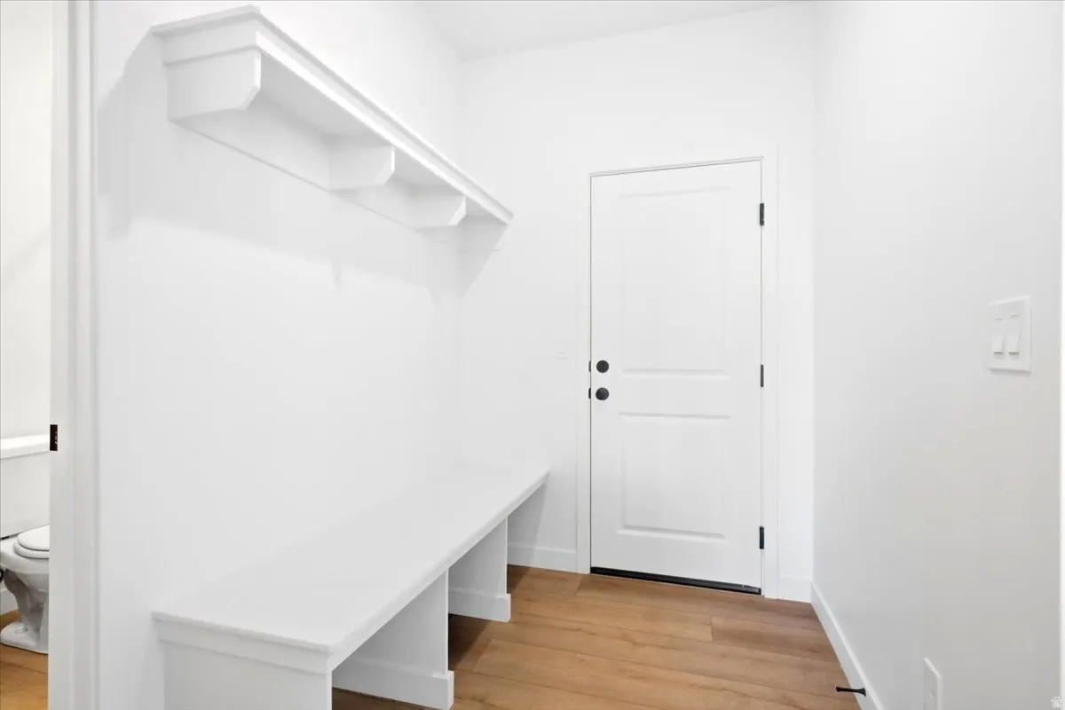 Mudroom by Garage with Bench and Shelf