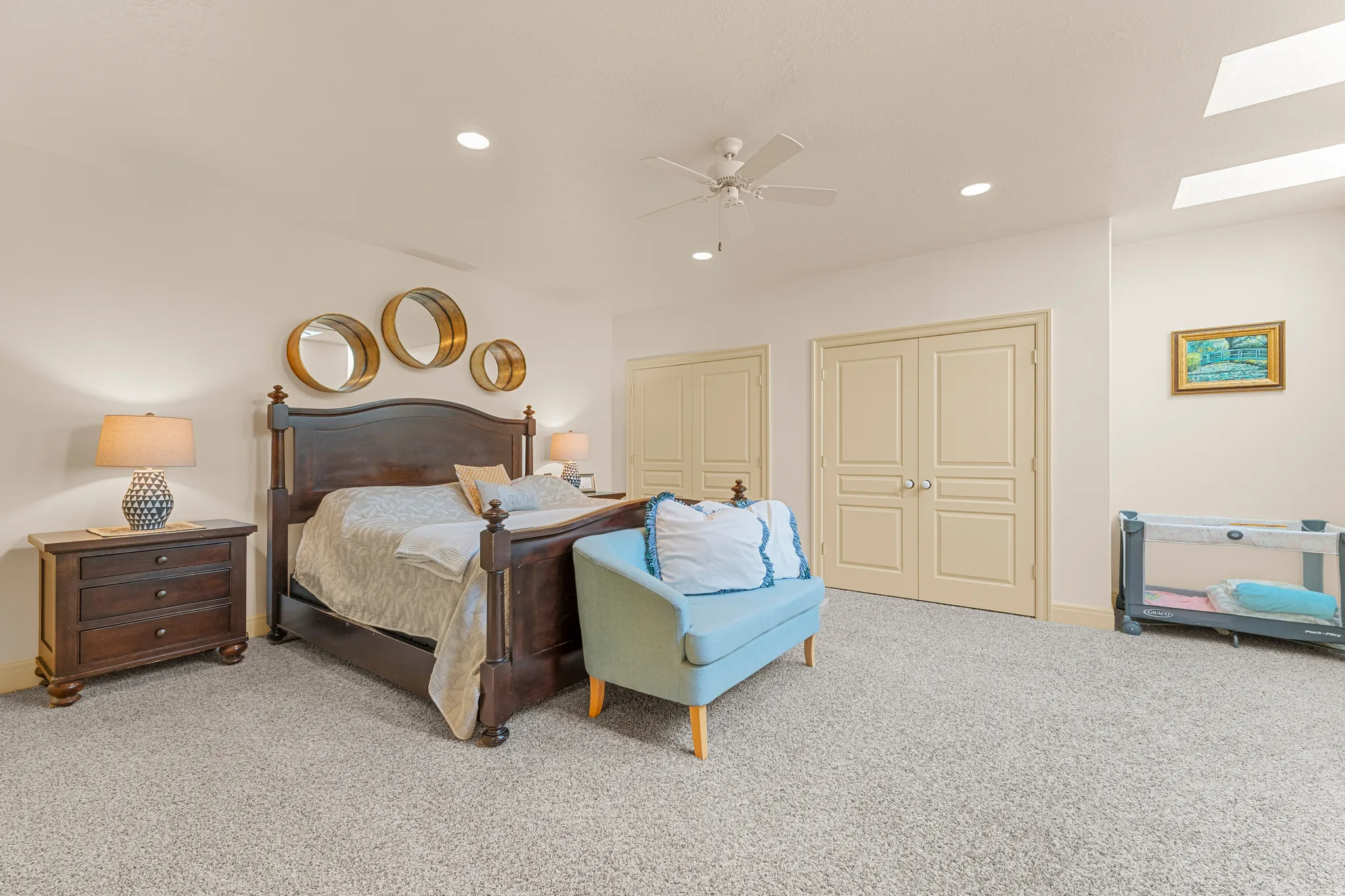 Recessed lighting, ceiling fan, and three skylights
