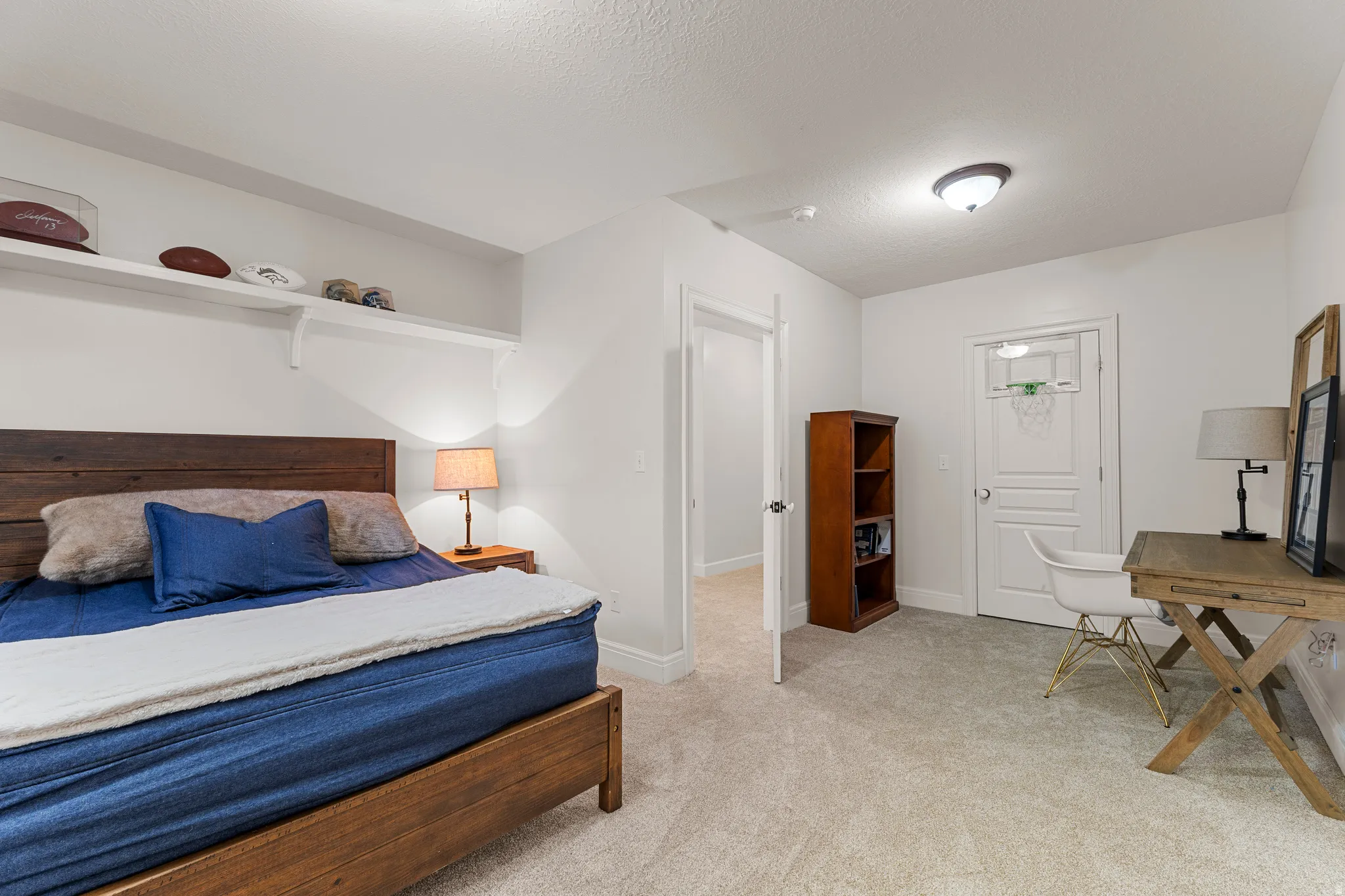 Wall-to-wall carpeting and white walls