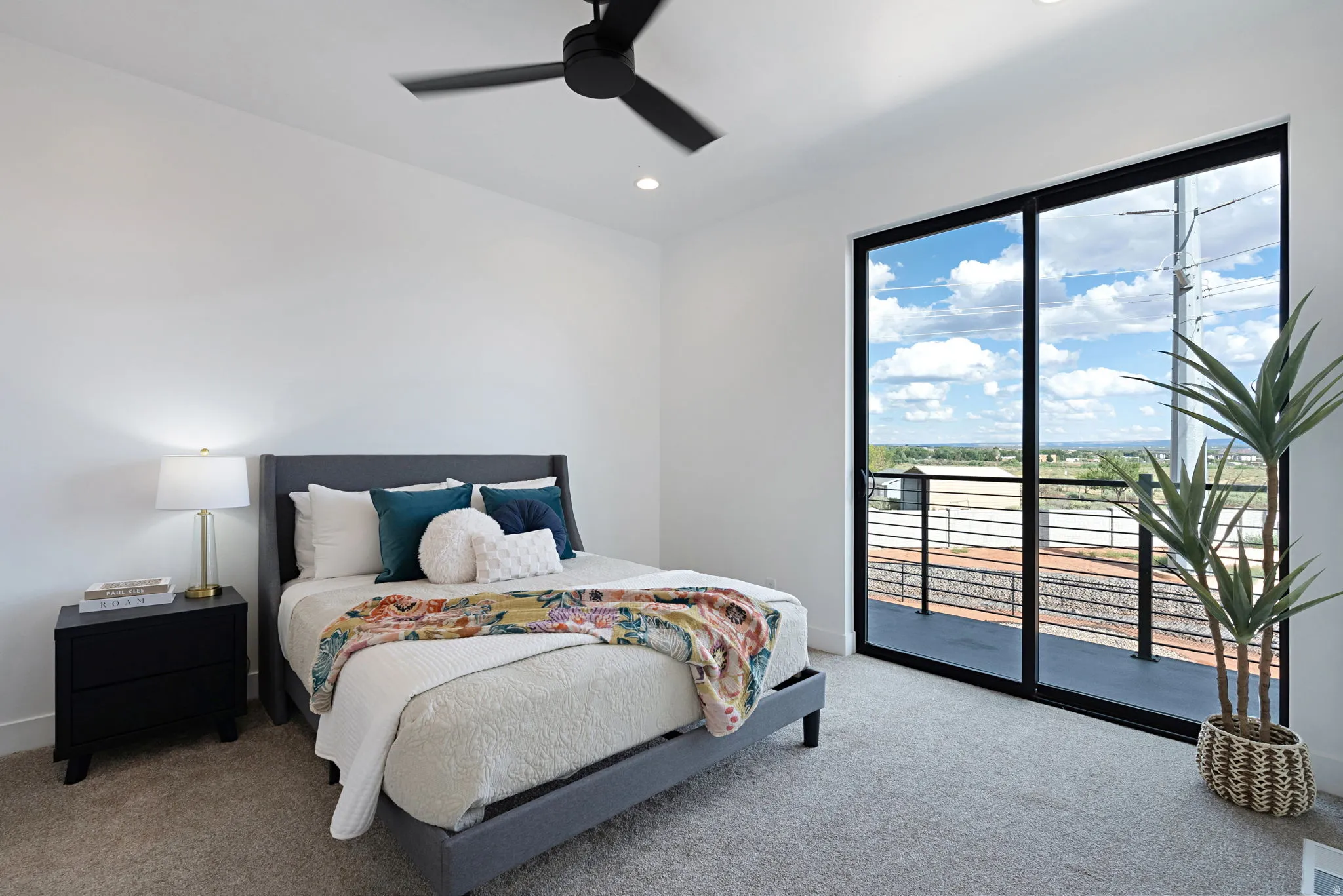 Recessed lighting, ceiling fan, and carpeted flooring