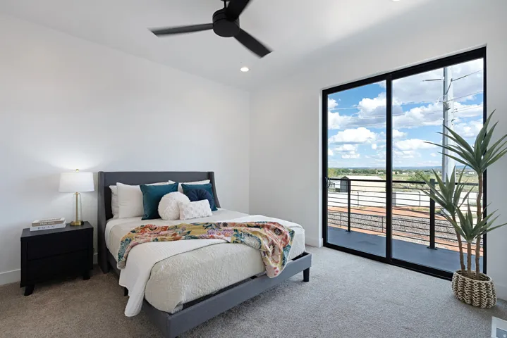 Recessed lighting, ceiling fan, and carpeted flooring