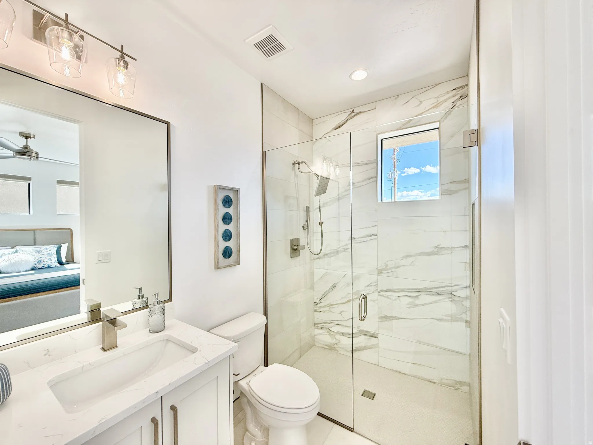Modern vanity with a rectangular undermount sink and polished chrome faucet