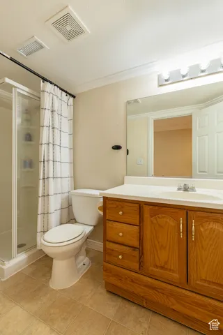 Wood-finish vanity with an integrated sink and base cabinetry