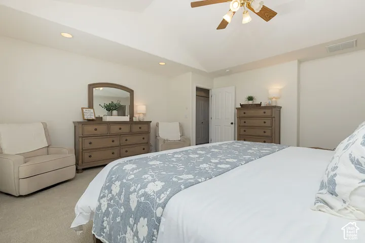 Tray ceiling with recessed lighting and a ceiling fan