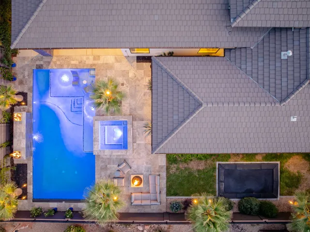 Multi-level pool with integrated spa and stone surround