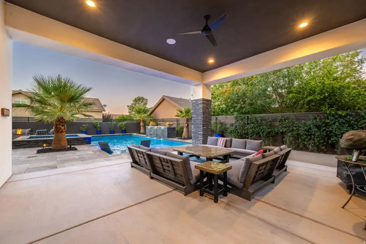 Covered patio with recessed lighting and a ceiling fan