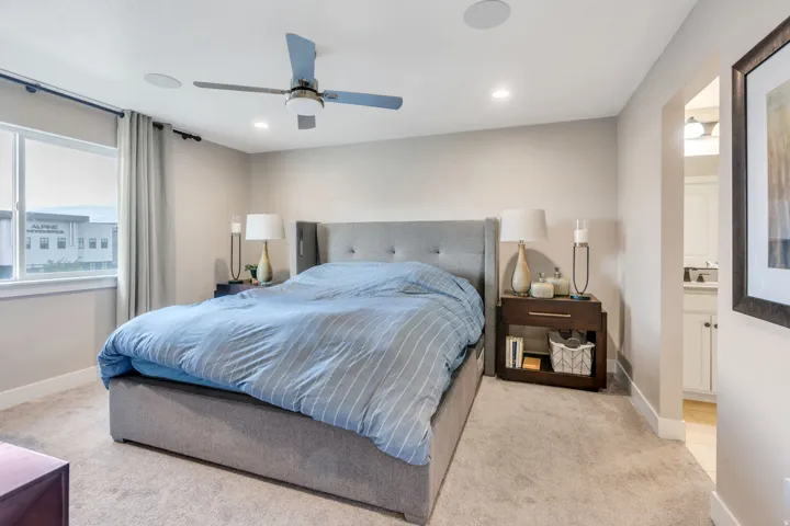 Recessed lighting, ceiling fan, and carpet flooring