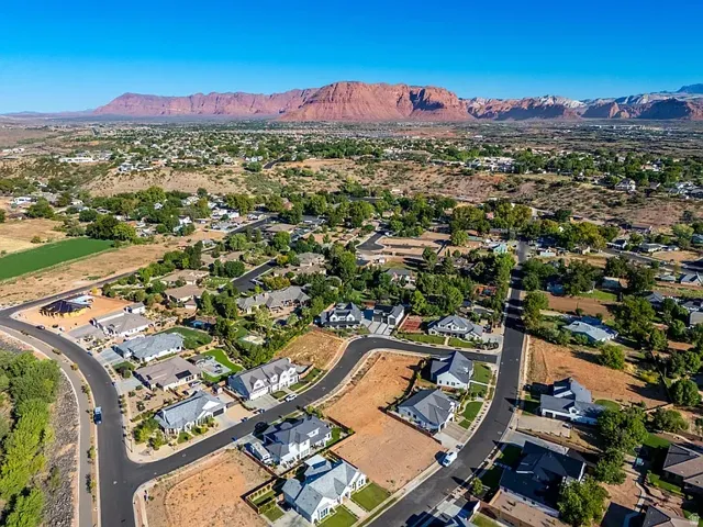 Residential development featuring paved streets and varied architectural styles
