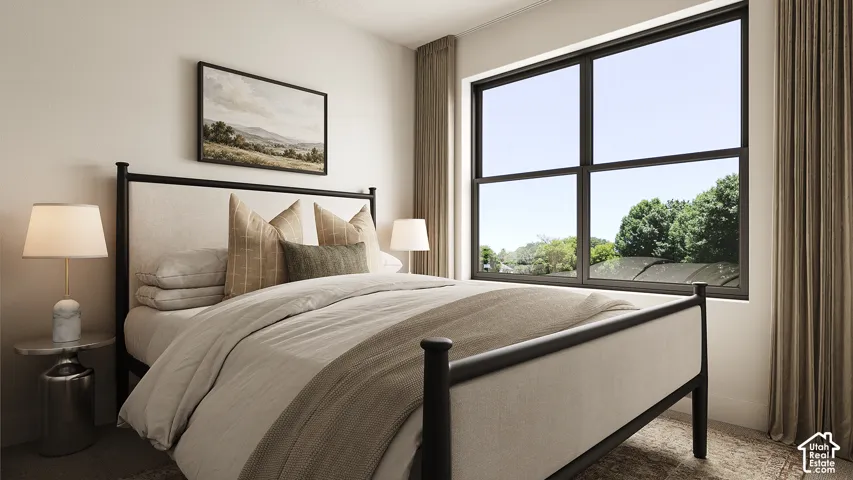 Large window with dark trim, light-toned walls, and soft floor covering