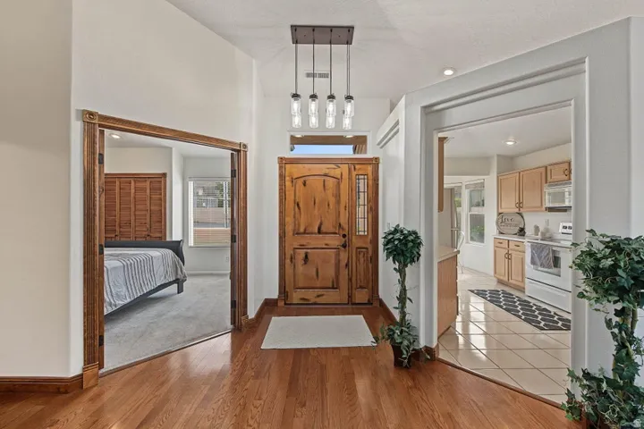 Wood-finish flooring throughout the entryway