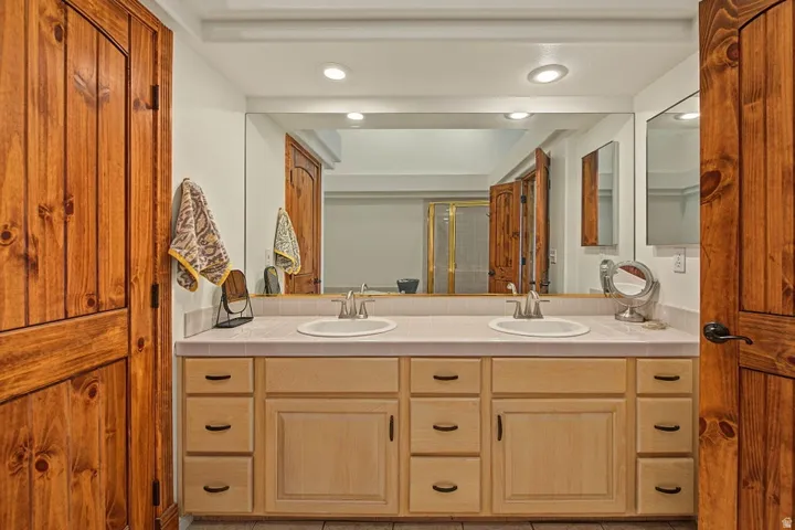 Dual wood-finish doors with arched details