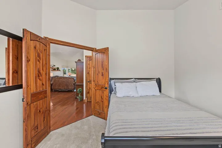 Carpeted flooring with light-toned walls